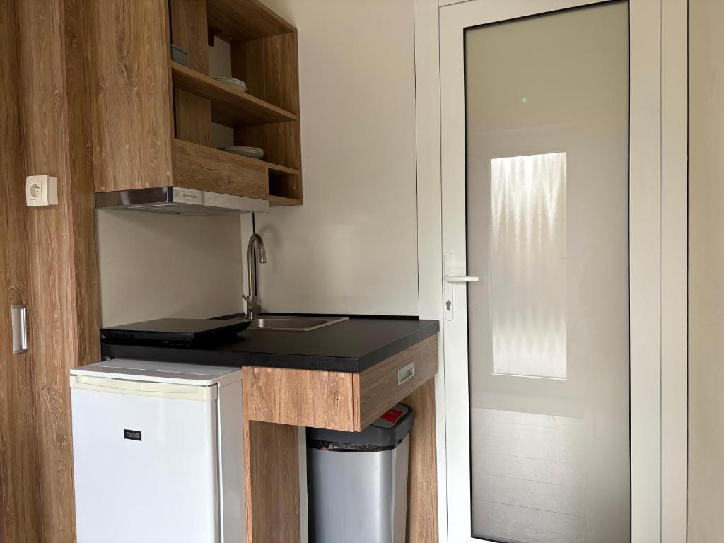 Kuchyň nebo kuchyňský kout v ubytování Apartmány I - KAfe Bojnice