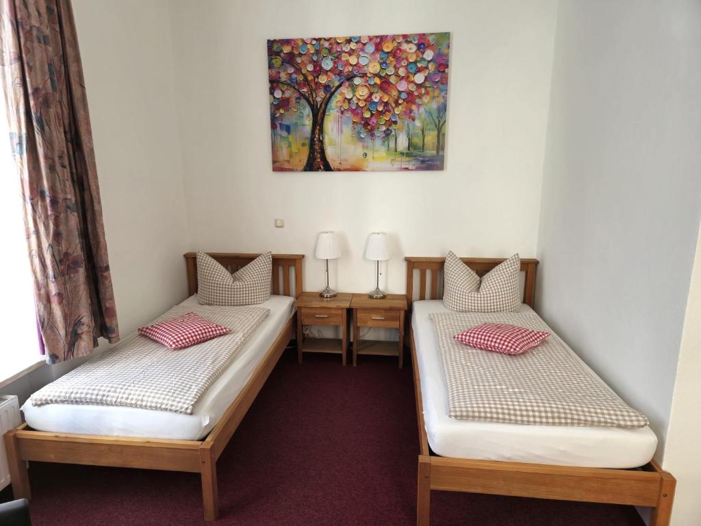 Postel nebo postele na pokoji v ubytování Hotel Meridian