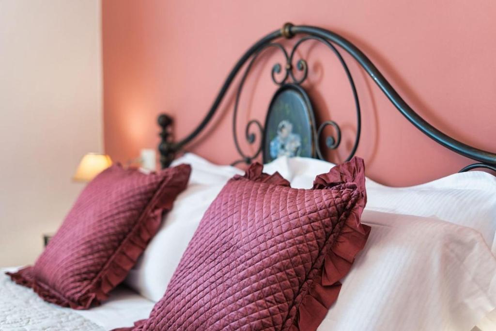 Postel nebo postele na pokoji v ubytování La Casa di Amelie