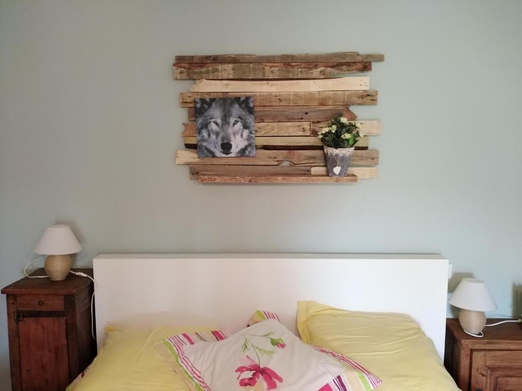 Postel nebo postele na pokoji v ubytování chambre studio La louve