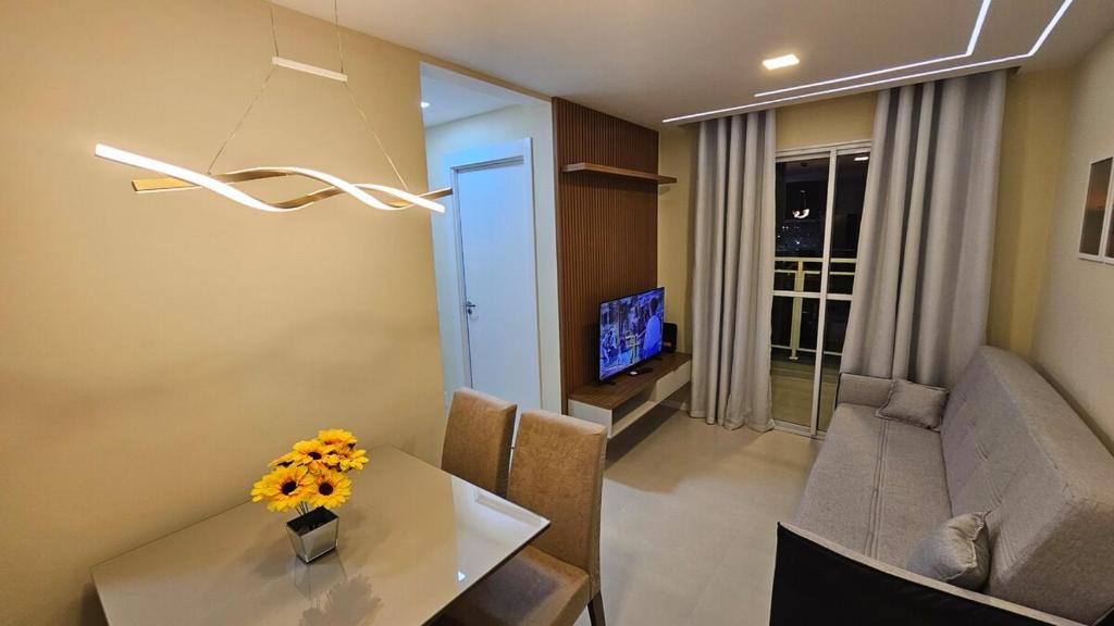 Posedenie v ubytovaní Apartamento Novo e Completo no Centro com garagem