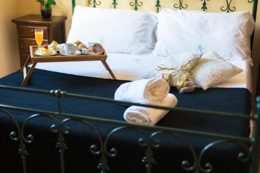 Postel nebo postele na pokoji v ubytování Hotel Columbia