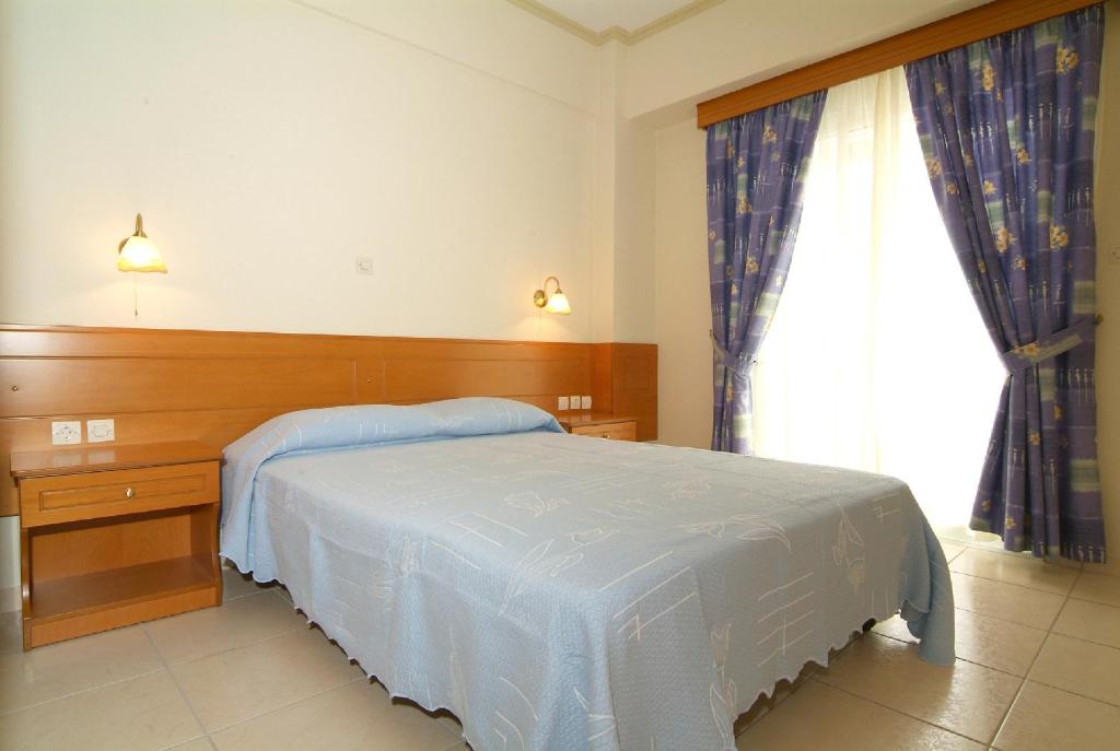 Postel nebo postele na pokoji v ubytování Sagittarius Apartments