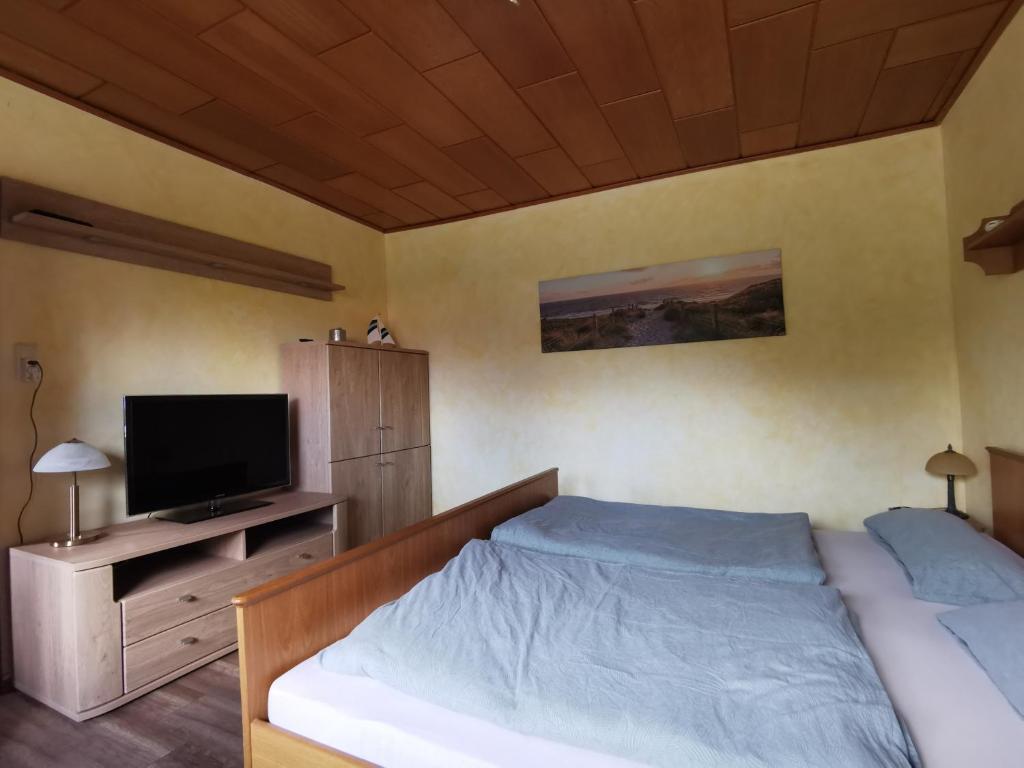 Postel nebo postele na pokoji v ubytování Dorfidylle Wiesens