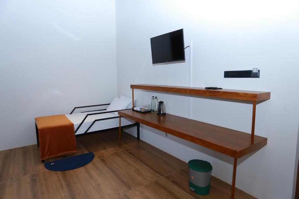 TV a/nebo společenská místnost v ubytování Tara Waterfall