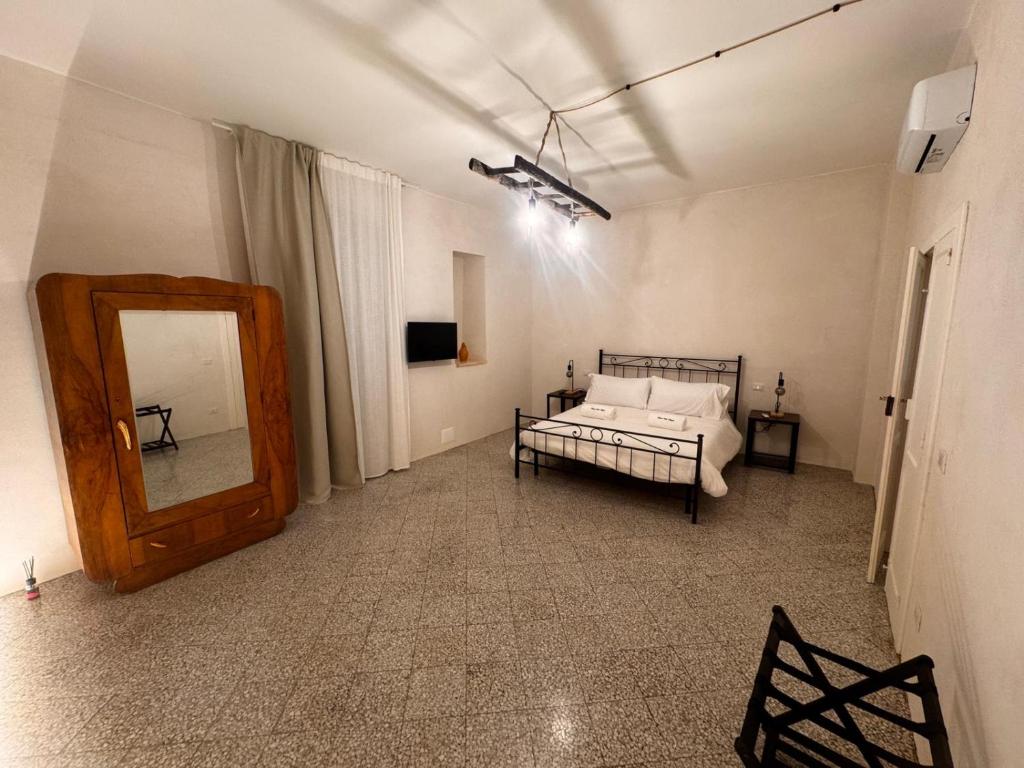 Postel nebo postele na pokoji v ubytování Borgo Sant Angelo