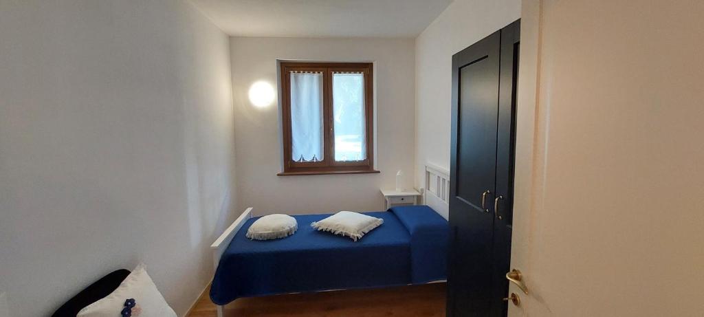 Postel nebo postele na pokoji v ubytování Casa del Fattore