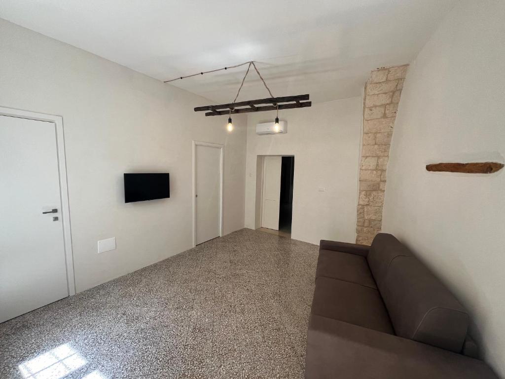 TV a/nebo společenská místnost v ubytování Borgo Sant Angelo