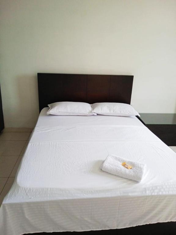 Postel nebo postele na pokoji v ubytování HOTEL MALU REAL POPAYAN Cauca