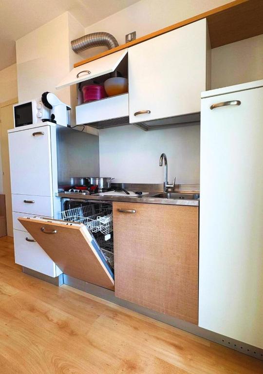 Kuchyň nebo kuchyňský kout v ubytování Aparthotel Royal