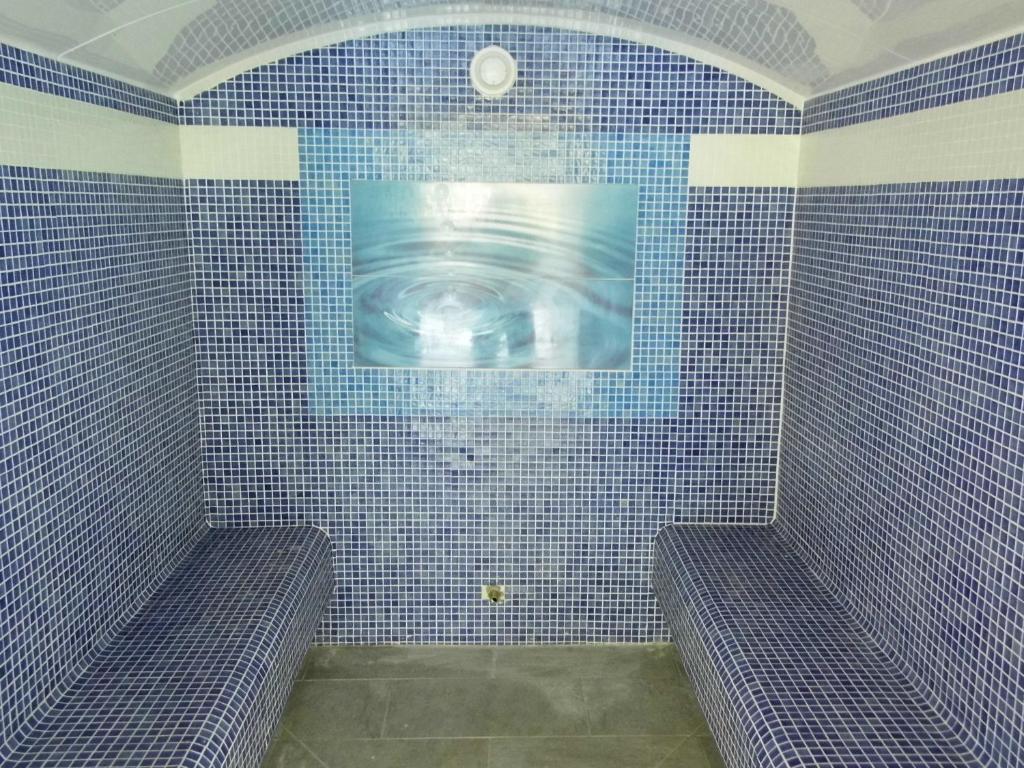 Koupelna v ubytování Hôtel Spa L'Ermitage