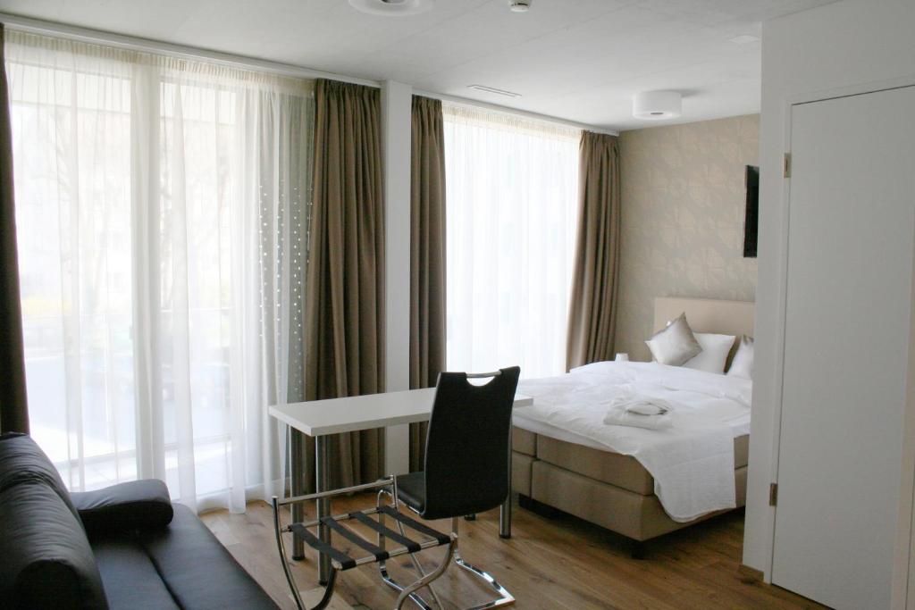 Postel nebo postele na pokoji v ubytování Residence Appartements