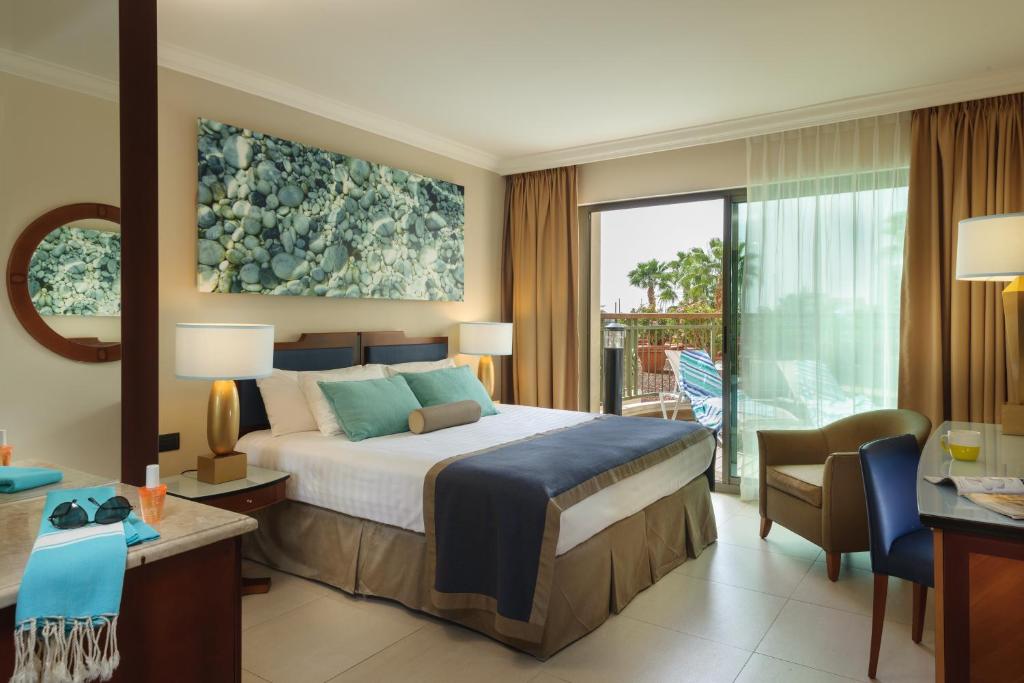 Ein Bett oder Betten in einem Zimmer der Unterkunft U Magic Palace