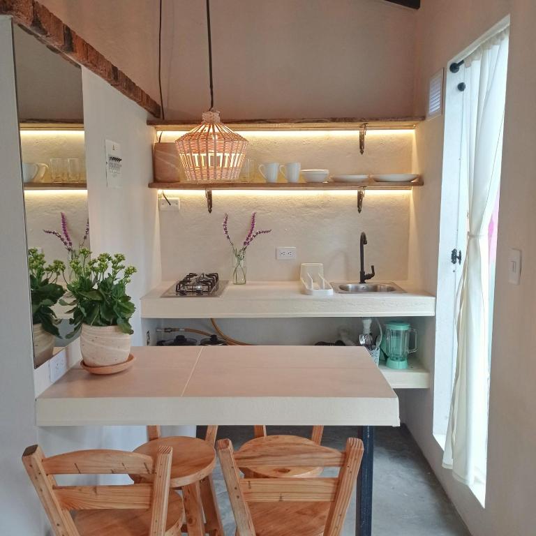 Kuchyň nebo kuchyňský kout v ubytování Ensueños cabaña glamping campestre suite1