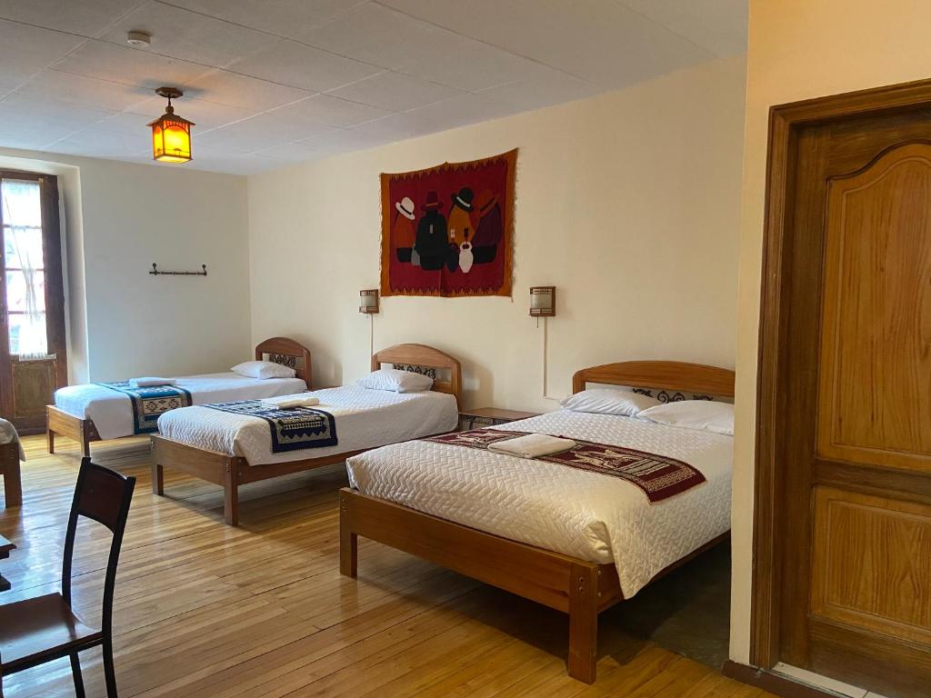 Postel nebo postele na pokoji v ubytování Mía Leticia B&B