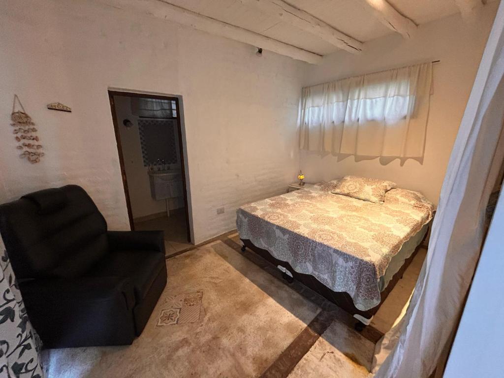 Voodi või voodid majutusasutuse Posada Via Vento - Chacras de Coria toas