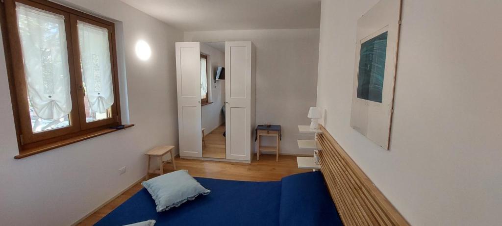 Postel nebo postele na pokoji v ubytování Casa del Fattore
