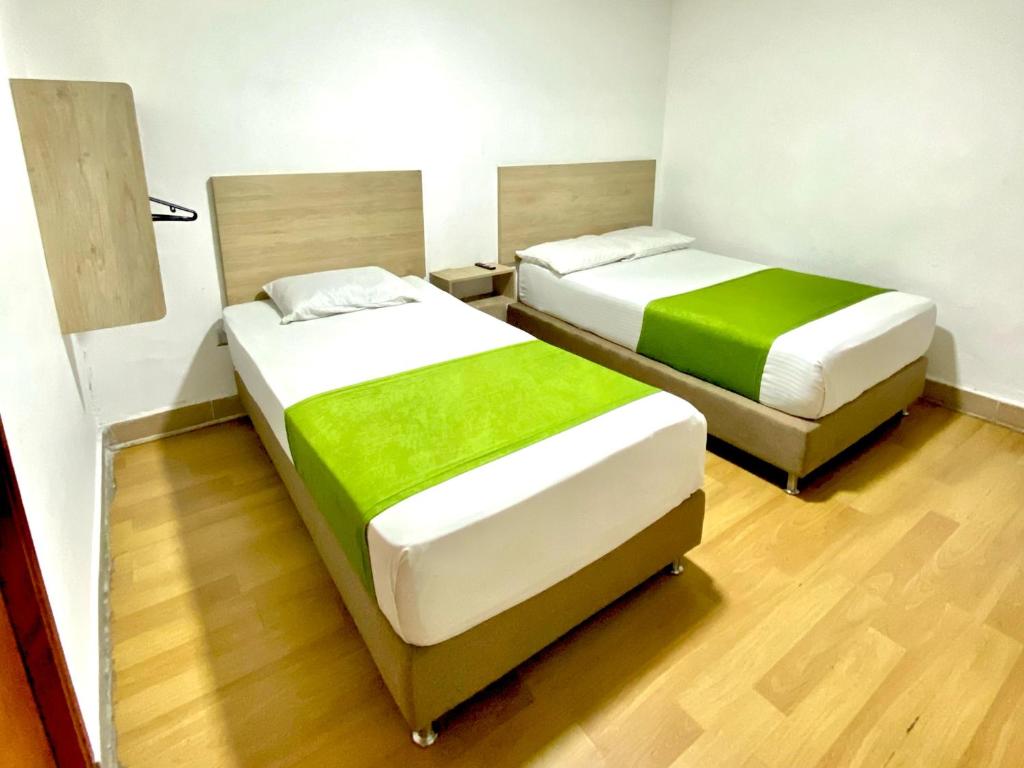 Postel nebo postele na pokoji v ubytování Hotel Boutique Street 50