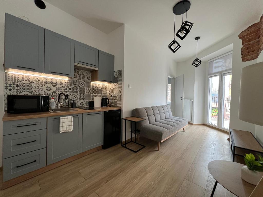Η κουζίνα ή μικρή κουζίνα στο Apartament Popiel