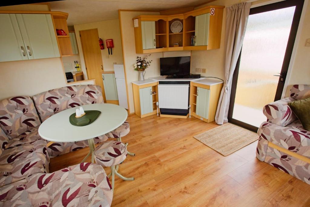 Kuchyň nebo kuchyňský kout v ubytování Ella Rose Mobile Home