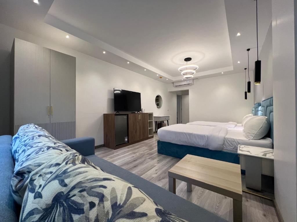 Postel nebo postele na pokoji v ubytování Onyx Pyramids Boutique Hotel
