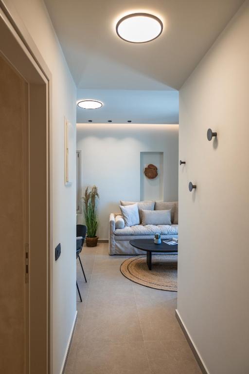 Postel nebo postele na pokoji v ubytování Depalyma Suites