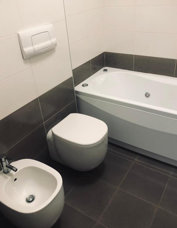 Koupelna v ubytování Stanza privata con bagno su appartamento condiviso