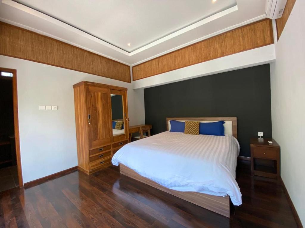 Ένα ή περισσότερα κρεβάτια σε δωμάτιο στο Sutji living