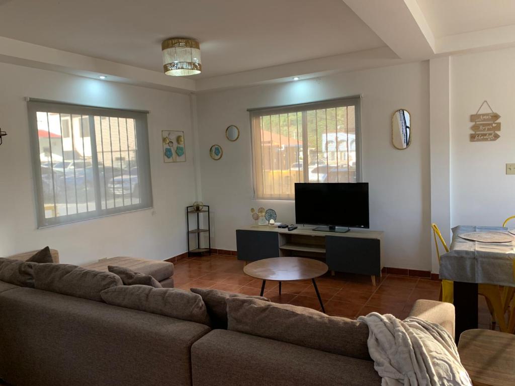TV a/nebo společenská místnost v ubytování Casita Central
