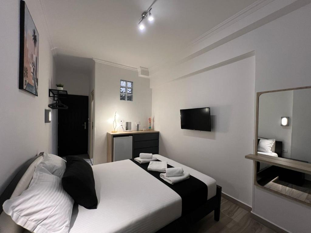 Postel nebo postele na pokoji v ubytování jericho rooms