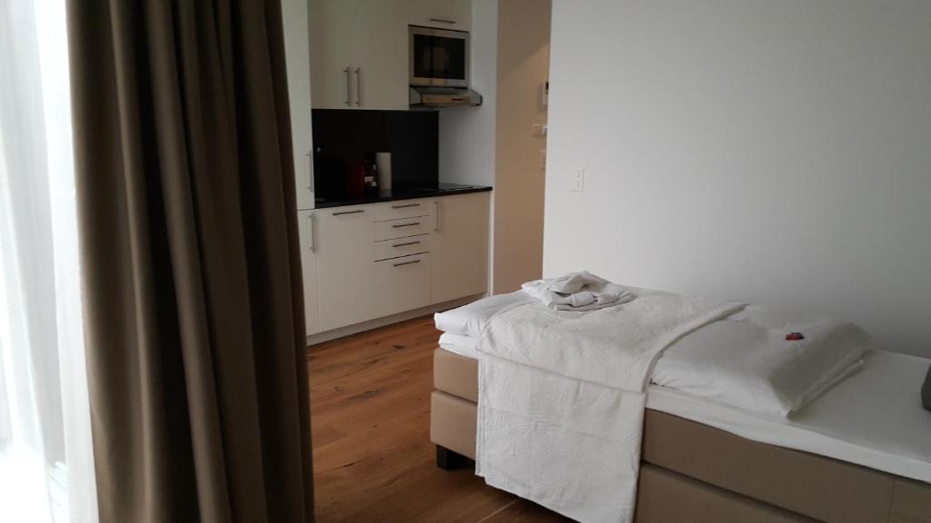 Postel nebo postele na pokoji v ubytování Residence Appartements