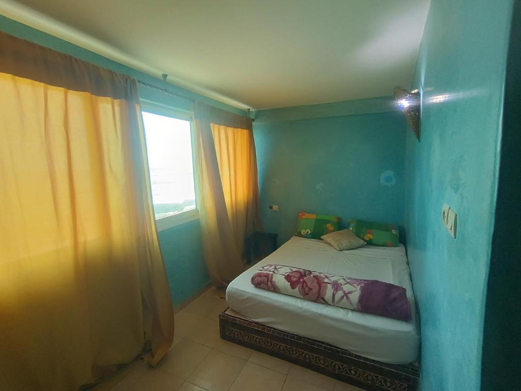 Ένα ή περισσότερα κρεβάτια σε δωμάτιο στο Anchor point break