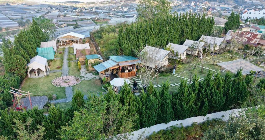 an aerial view of a village with houses and trees at Santolina Homestay - Tây Hồ Hill in Da Lat
