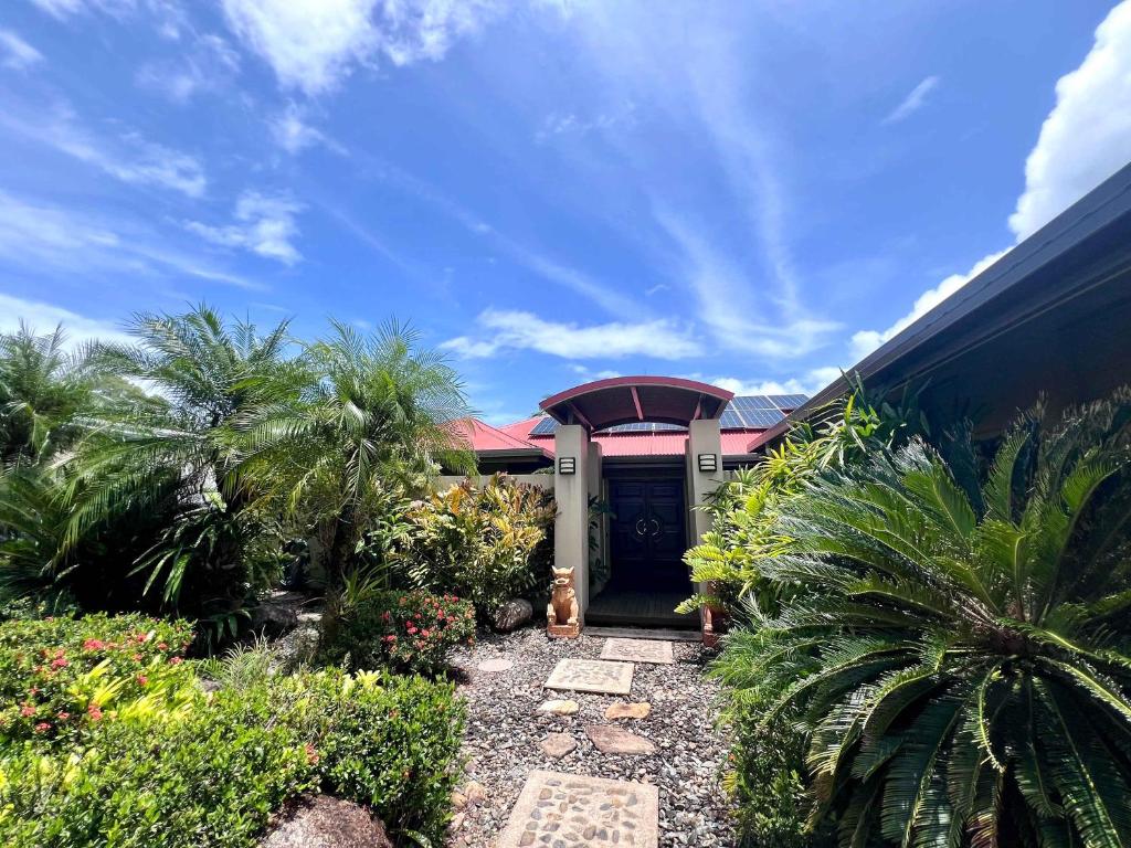 a house with a cat sitting in front of it at SpiritU at Mission Beach in Mission Beach