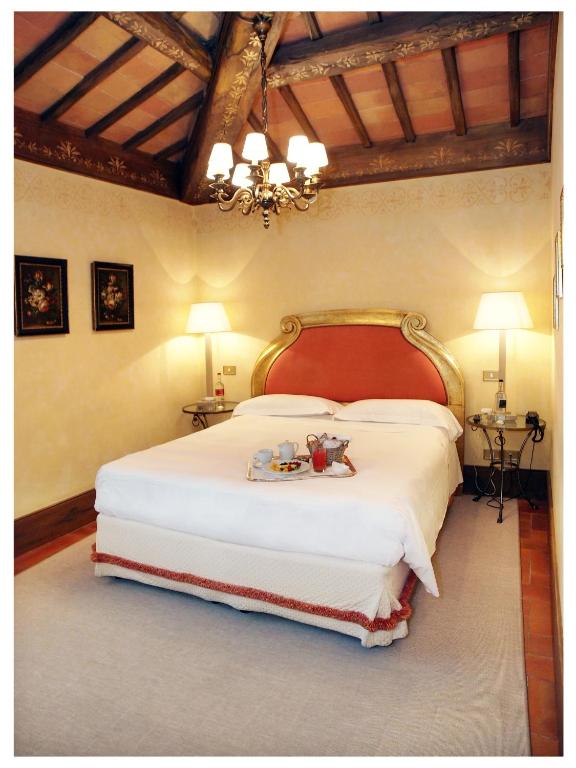Posteľ alebo postele v izbe v ubytovaní Relais Todini - Residenza d'epoca - Luxury Historic house