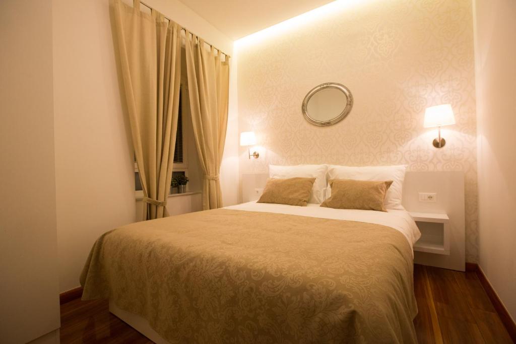 Postel nebo postele na pokoji v ubytování Casa Arancia