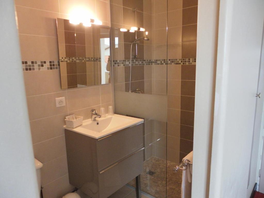 Koupelna v ubytování Hôtel Le Plaisance