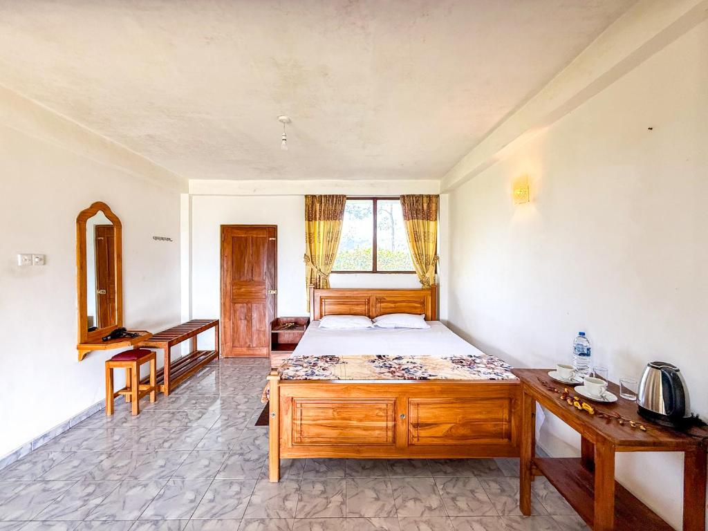 Postel nebo postele na pokoji v ubytování Ella Mountain Palace