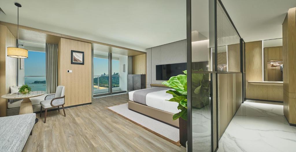 Postel nebo postele na pokoji v ubytování Grand Ocean View Hotel Zhuhai
