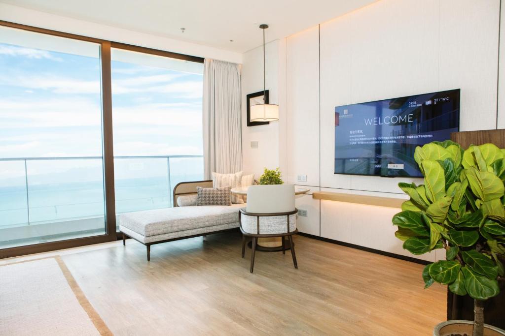 TV a/nebo společenská místnost v ubytování Grand Ocean View Hotel Zhuhai