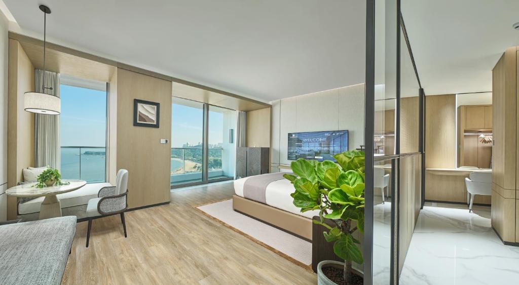 Postel nebo postele na pokoji v ubytování Grand Ocean View Hotel Zhuhai
