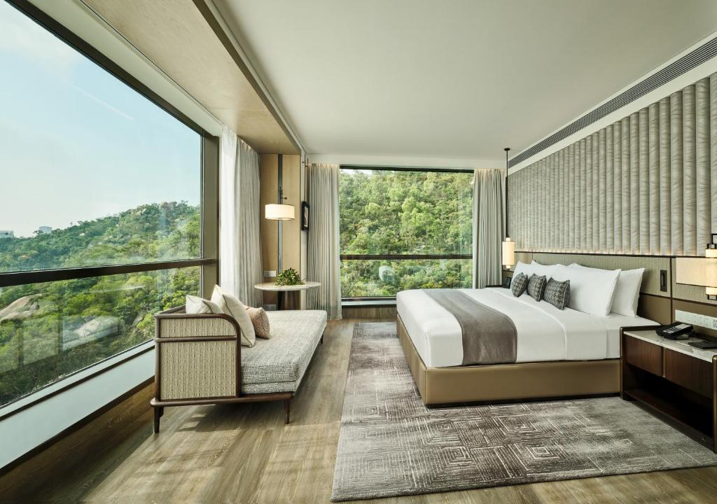 Postel nebo postele na pokoji v ubytování Grand Ocean View Hotel Zhuhai