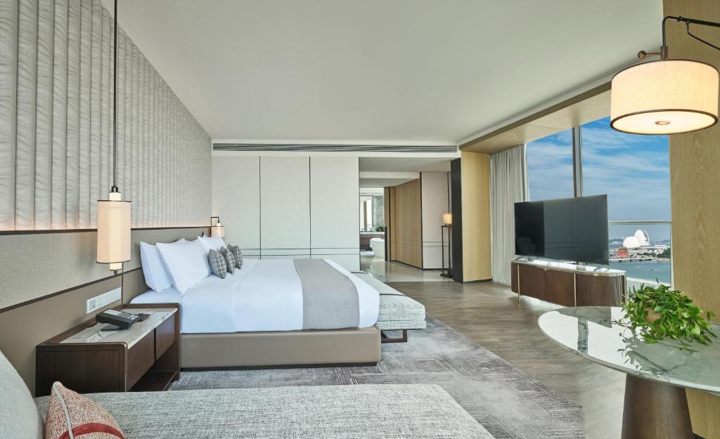 TV a/nebo společenská místnost v ubytování Grand Ocean View Hotel Zhuhai