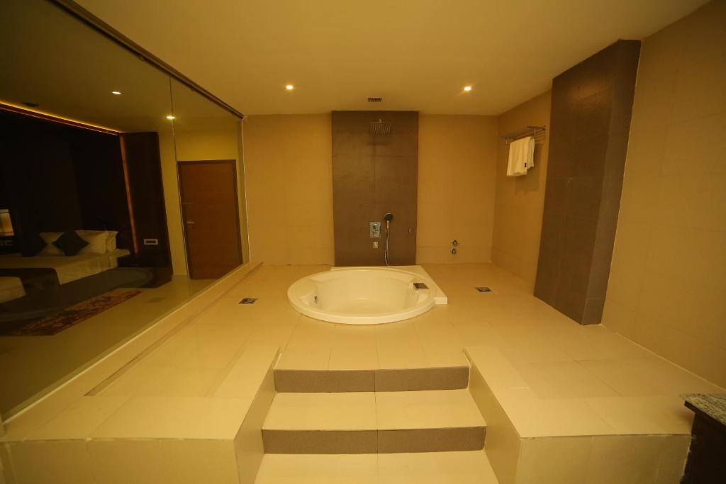 Koupelna v ubytování Vavas Inn & Suites