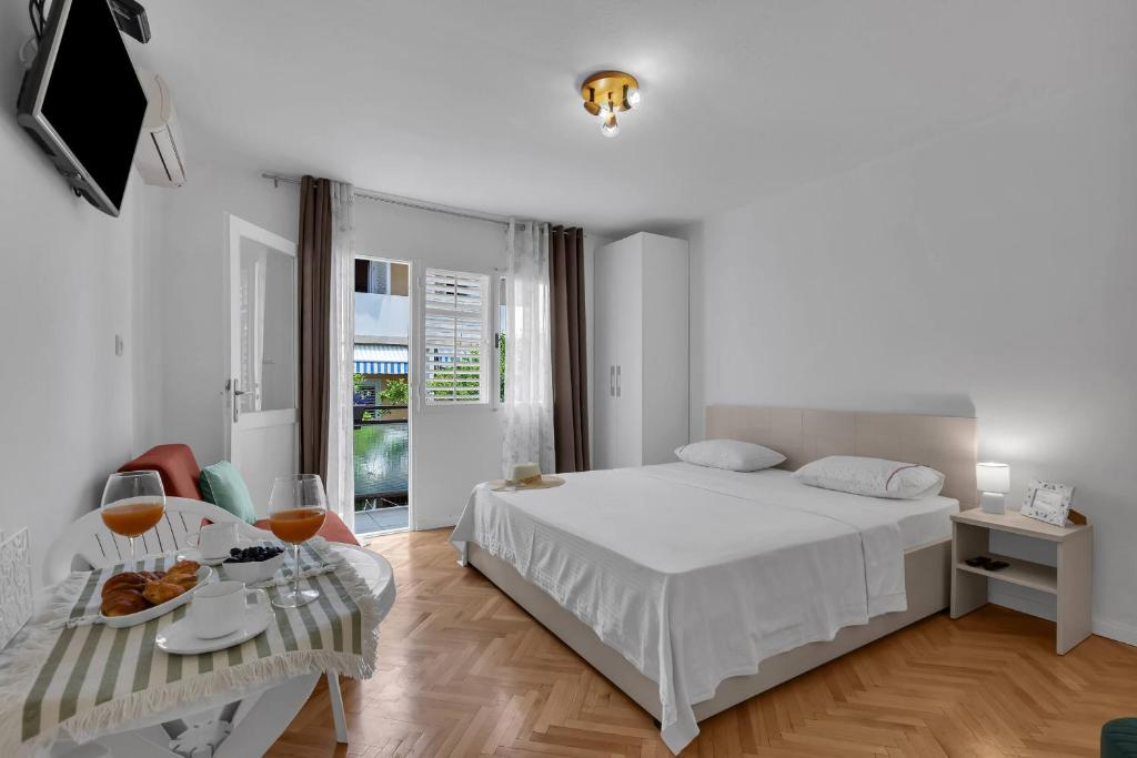 Posteľ alebo postele v izbe v ubytovaní Urban Studios