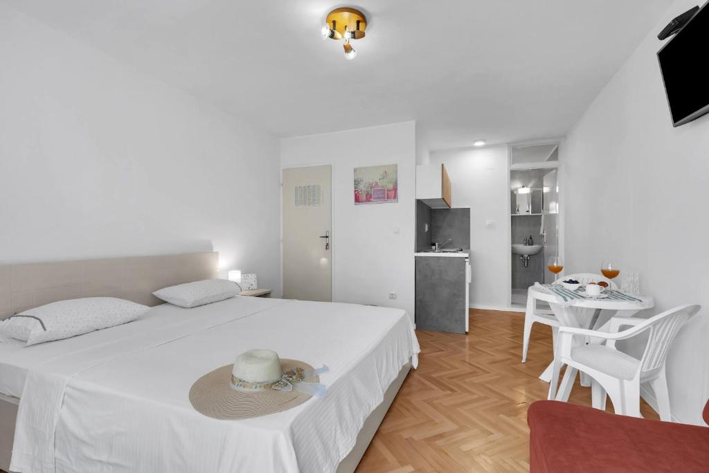 Posteľ alebo postele v izbe v ubytovaní Urban Studios