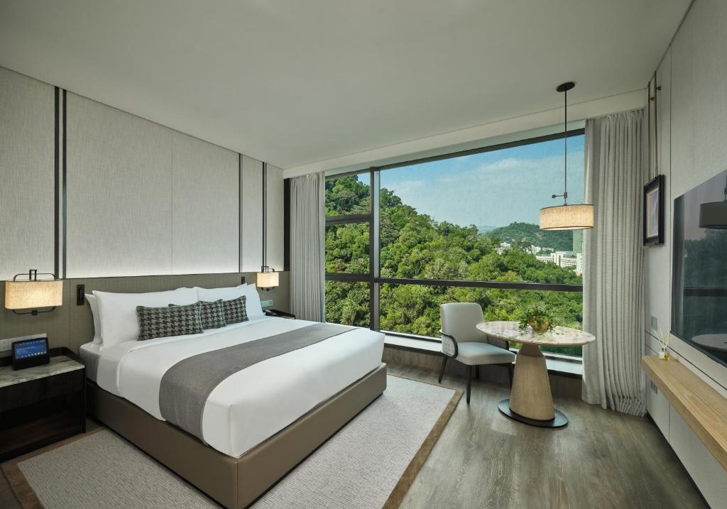 Postel nebo postele na pokoji v ubytování Grand Ocean View Hotel Zhuhai