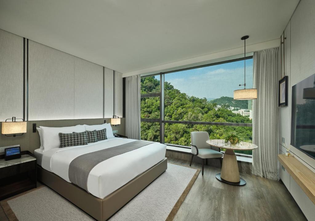 Postel nebo postele na pokoji v ubytování Grand Ocean View Hotel Zhuhai