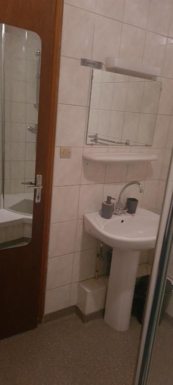 Koupelna v ubytování Gîte et chambres d'hôtes Les Framboises