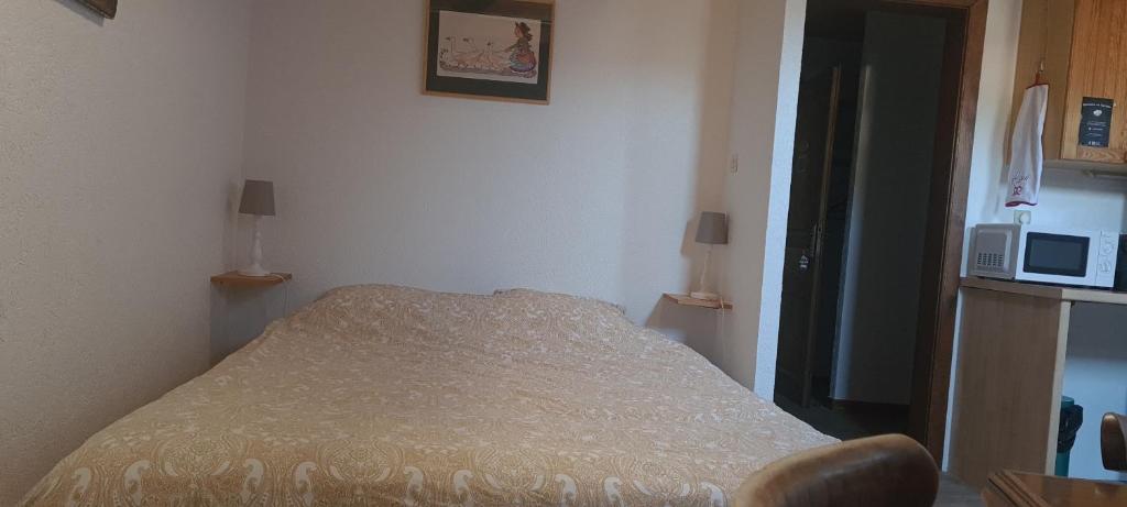 Postel nebo postele na pokoji v ubytování Gîte et chambres d'hôtes Les Framboises